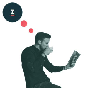 homme assis lecture café