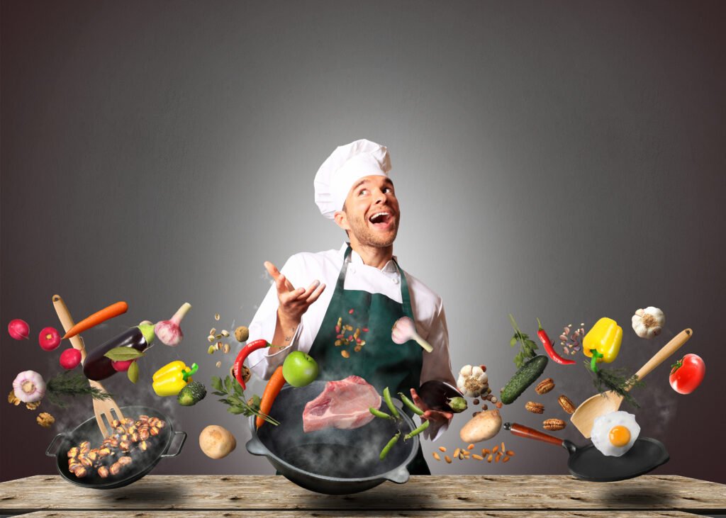 Chef de cuisine qui jongle avec légumes, casserole et viande dans une cuisine - outils de fidélisation client